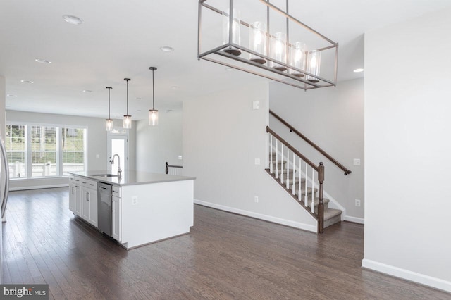 3393 Monterey Dr, Rockingham, VA 22801 - kitchen with dark wood-type flooring, dishwasher, white cabinetry, and an island with sink