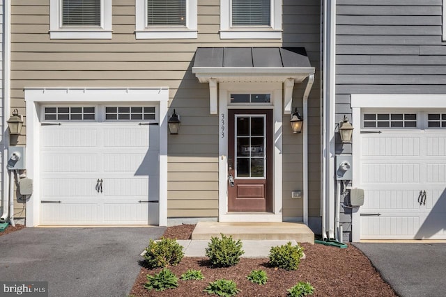 3393 Monterey Dr, Rockingham, VA 22801 - view of exterior entry featuring driveway and a garage