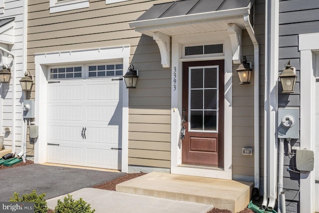 3393 Monterey Dr, Rockingham, VA 22801 - view of exterior entry with a garage