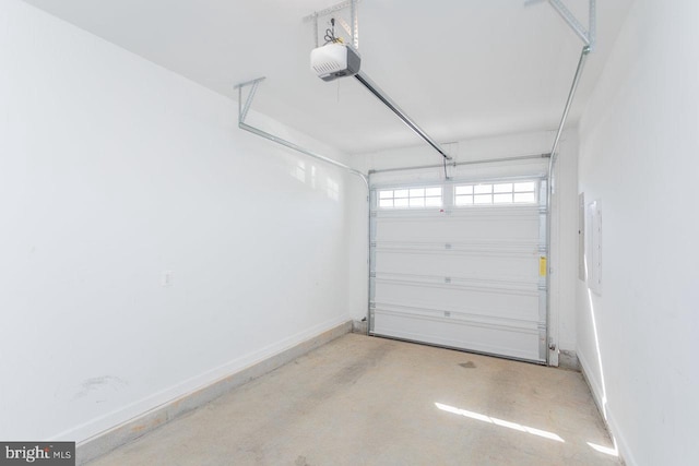 3393 Monterey Dr, Rockingham, VA 22801 - garage featuring baseboards and a garage door opener