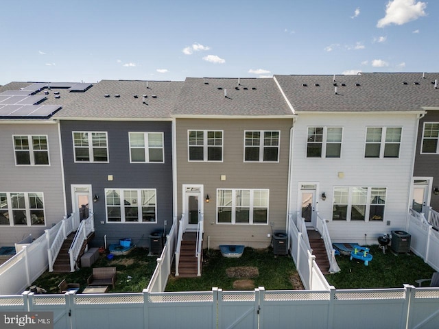 3393 Monterey Dr, Rockingham, VA 22801 - rear view of house featuring cooling unit, a fenced front yard, and a gate