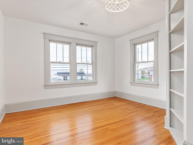 803 Berryville Ave, Winchester, VA 22601 - unfurnished room featuring light wood-type flooring, baseboards, and visible vents