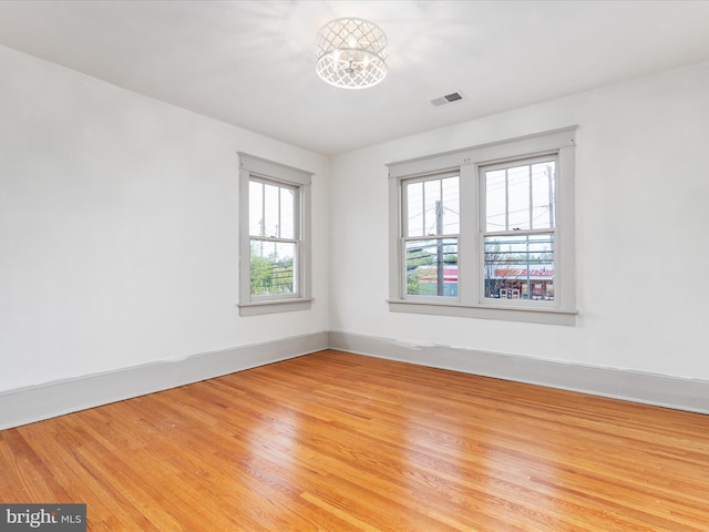 803 Berryville Ave, Winchester, VA 22601 - empty room featuring baseboards, light wood-style floors, and visible vents