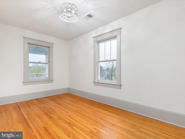 803 Berryville Ave, Winchester, VA 22601 - empty room with light wood-style floors, baseboards, and visible vents