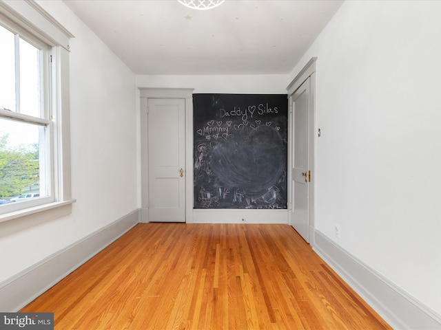 803 Berryville Ave, Winchester, VA 22601 - spare room featuring light wood-style flooring and baseboards