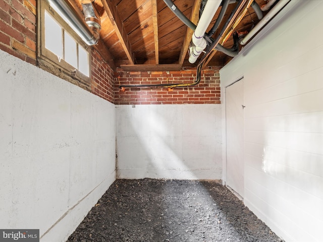 803 Berryville Ave, Winchester, VA 22601 - unfinished below grade area featuring brick wall