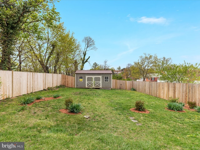 803 Berryville Ave, Winchester, VA 22601 - view of yard with a fenced backyard, a storage unit, and an outdoor structure