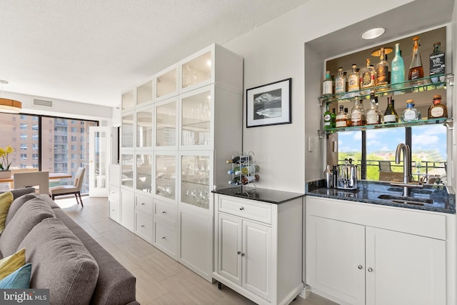1530 Key Blvd Unit 528, Arlington, VA 22209 - indoor wet bar with light tile patterned flooring