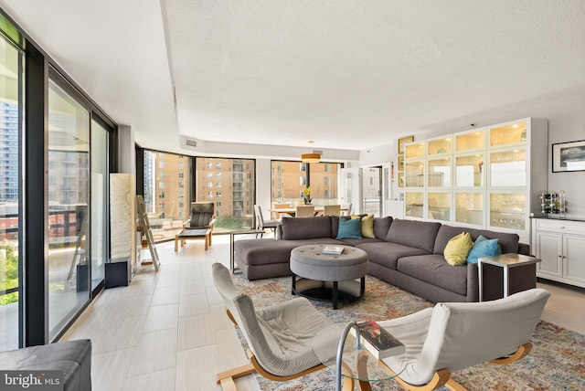 1530 Key Blvd Unit 528, Arlington, VA 22209 - living area with plenty of natural light and a textured ceiling