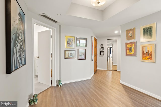 1530 Key Blvd Unit 528, Arlington, VA 22209 - hallway featuring light wood finished floors, baseboards, and recessed lighting