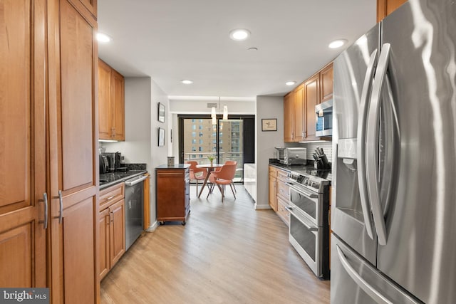 1530 Key Blvd Unit 528, Arlington, VA 22209 - kitchen featuring stainless steel appliances, dark countertops, light wood-style floors, recessed lighting, and brown cabinets