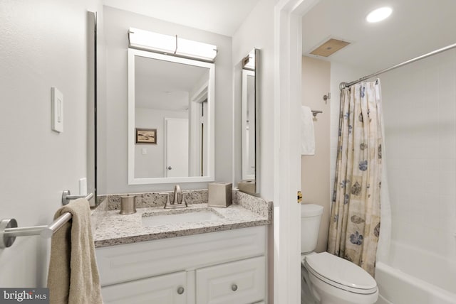 1530 Key Blvd Unit 528, Arlington, VA 22209 - bathroom with toilet, vanity, and shower / bath combo with shower curtain