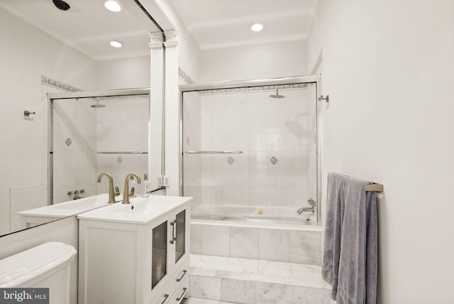 bathroom featuring toilet, vanity, recessed lighting, and tiled shower / bath combo