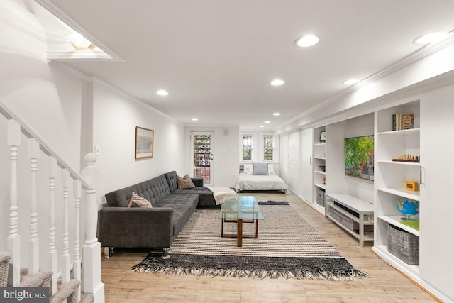 living area with ornamental molding, recessed lighting, stairs, and light wood-style flooring
