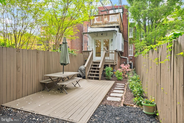 deck featuring a fenced backyard