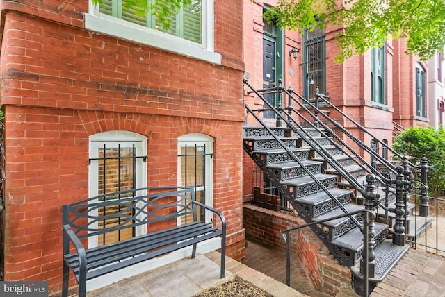 entrance to property with brick siding