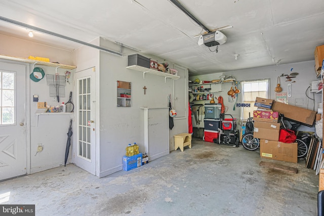 garage featuring a garage door opener
