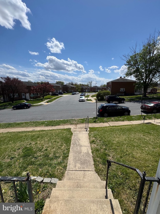 view of yard with a residential view