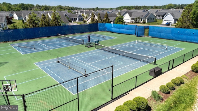 233 Nobles Pond Xing, Dover, DE 19904 - view of tennis court featuring community basketball court, fence, and a residential view