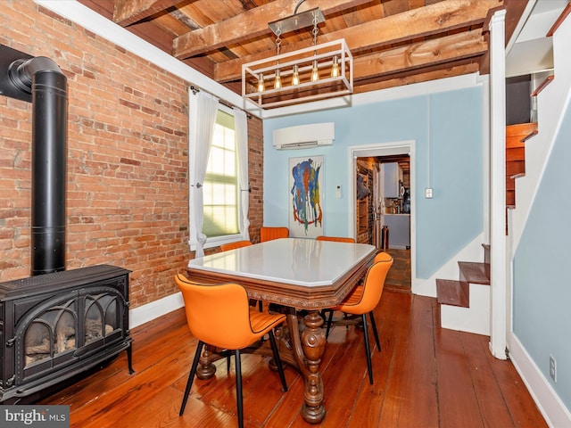 435S Market St, Frederick, MD 21701 - dining area with a wall unit AC, wooden ceiling, brick wall, and stairs