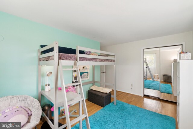 bedroom featuring wood finished floors