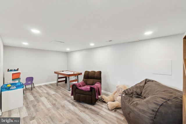 sitting room featuring recessed lighting, visible vents, baseboards, and light wood-type flooring