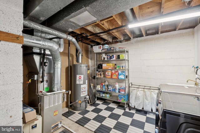 unfinished below grade area featuring tile patterned floors, concrete block wall, and gas water heater