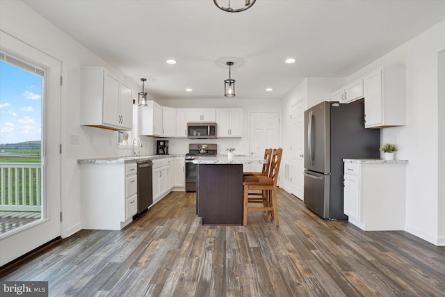 6301 Buchanan Trl W, Mercersburg, PA 17236 - kitchen featuring white cabinets, a center island, baseboards, appliances with stainless steel finishes, and dark wood-type flooring
