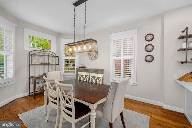 510 Quincy St NW, Washington, DC 20011 - dining space with baseboards and wood finished floors