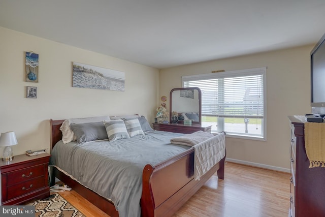 103 N Spinnaker Ln, Milton, DE 19966 - bedroom featuring wood finished floors and baseboards