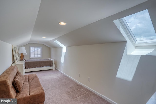 103 N Spinnaker Ln, Milton, DE 19966 - carpeted bedroom with lofted ceiling, baseboards, recessed lighting, and a skylight