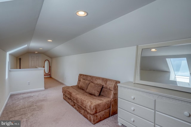 103 N Spinnaker Ln, Milton, DE 19966 - sitting room with carpet flooring, vaulted ceiling, baseboards, recessed lighting, and a skylight