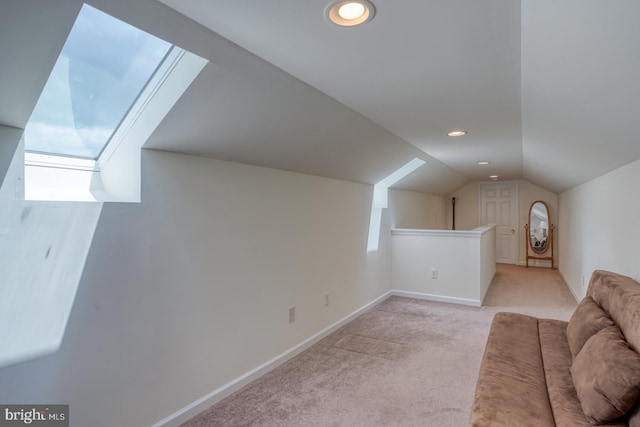 103 N Spinnaker Ln, Milton, DE 19966 - additional living space featuring a skylight, light colored carpet, lofted ceiling, baseboards, and recessed lighting