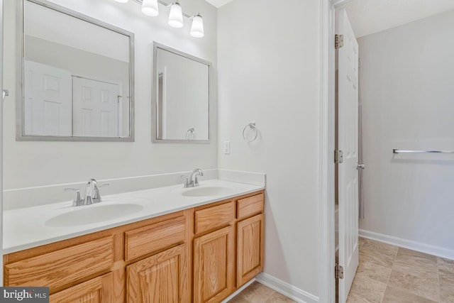 full bathroom with double vanity and tile patterned flooring