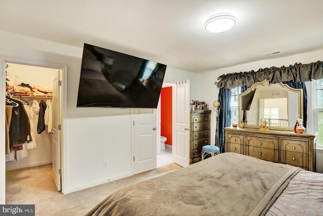 18010 Dave Anne Cir, Stewartstown, PA 17363 - bedroom with a spacious closet, light carpet, connected bathroom, baseboards, and a closet