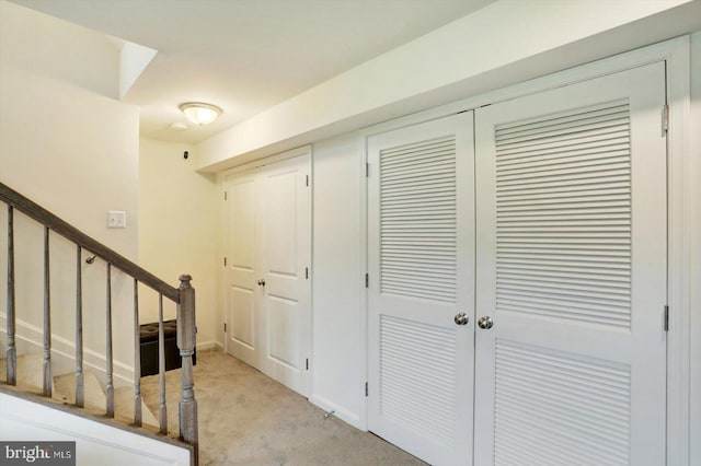 18010 Dave Anne Cir, Stewartstown, PA 17363 - entryway featuring light colored carpet, stairway, and baseboards