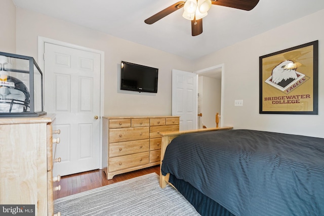 bedroom with ceiling fan and wood finished floors