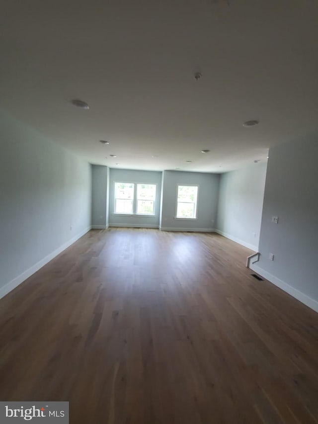 5100 Fitch St SE, Washington, DC 20019 - empty room featuring wood finished floors and baseboards