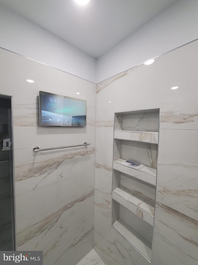 5100 Fitch St SE, Washington, DC 20019 - full bathroom with a marble finish shower