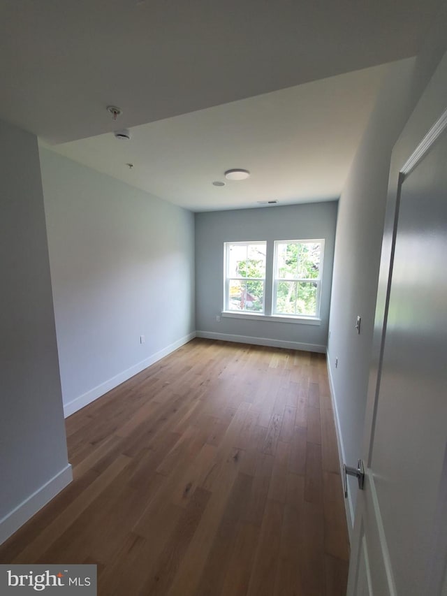 5100 Fitch St SE, Washington, DC 20019 - unfurnished room with baseboards and wood finished floors