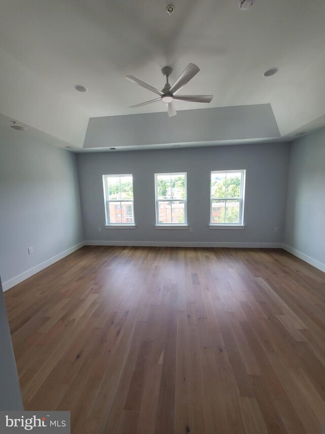5100 Fitch St SE, Washington, DC 20019 - spare room with ceiling fan, plenty of natural light, baseboards, and wood finished floors