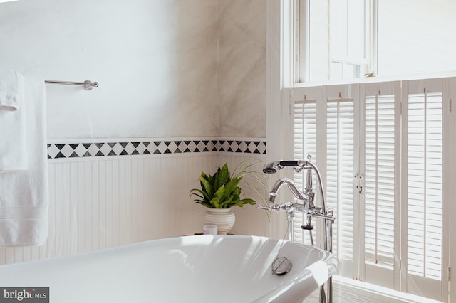 bathroom featuring a freestanding bath