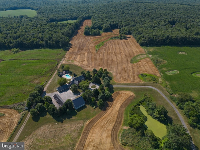 drone / aerial view with a rural view and a view of trees