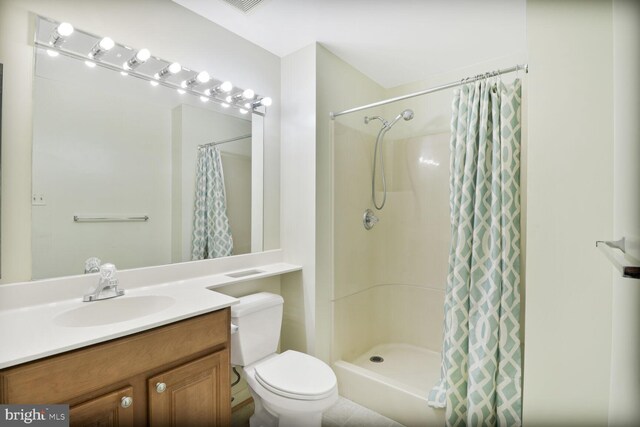 75 Ashlar Hill Ct Unit 75, Baltimore, MD 21234 - bathroom featuring a shower with curtain, toilet, and vanity