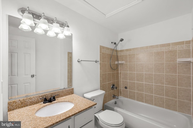 bathroom featuring bathtub / shower combination, vanity, and toilet