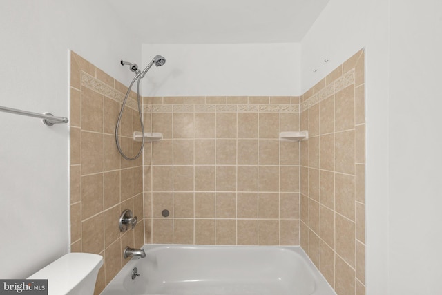 full bath with shower / bath combination and toilet