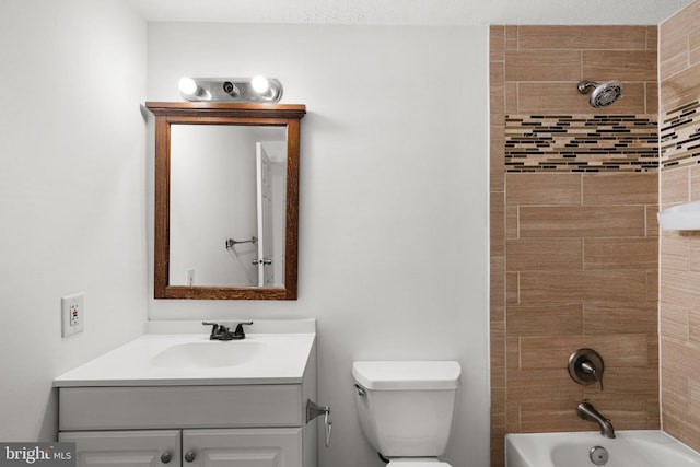 bathroom with toilet, vanity, and shower / bath combination