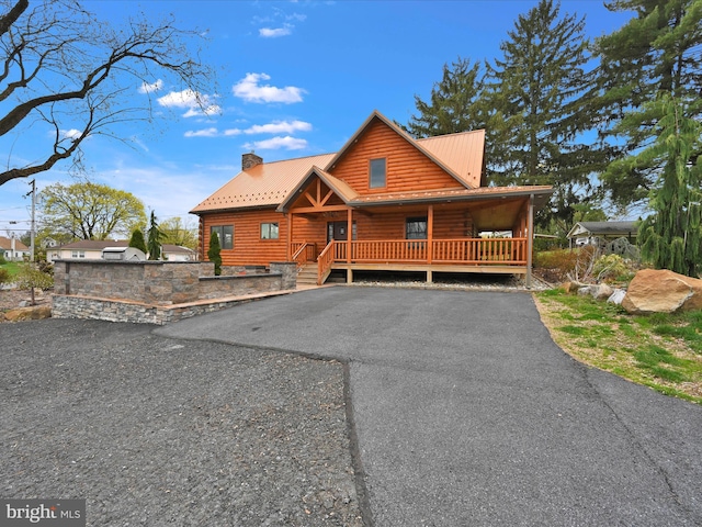 1918 Friedensburg Rd, Reading, PA 19606 - log cabin featuring a porch, a chimney, metal roof, and aphalt driveway