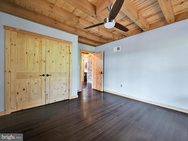 1918 Friedensburg Rd, Reading, PA 19606 - unfurnished bedroom featuring beam ceiling, dark wood-style flooring, baseboards, visible vents, and wooden ceiling