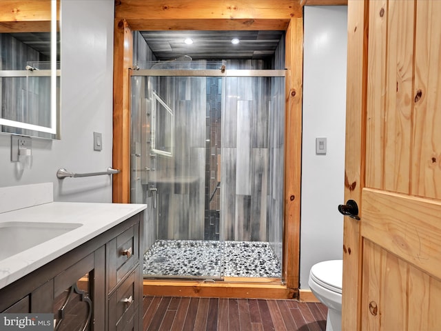 1918 Friedensburg Rd, Reading, PA 19606 - full bath featuring wood finished floors, vanity, a shower stall, and toilet